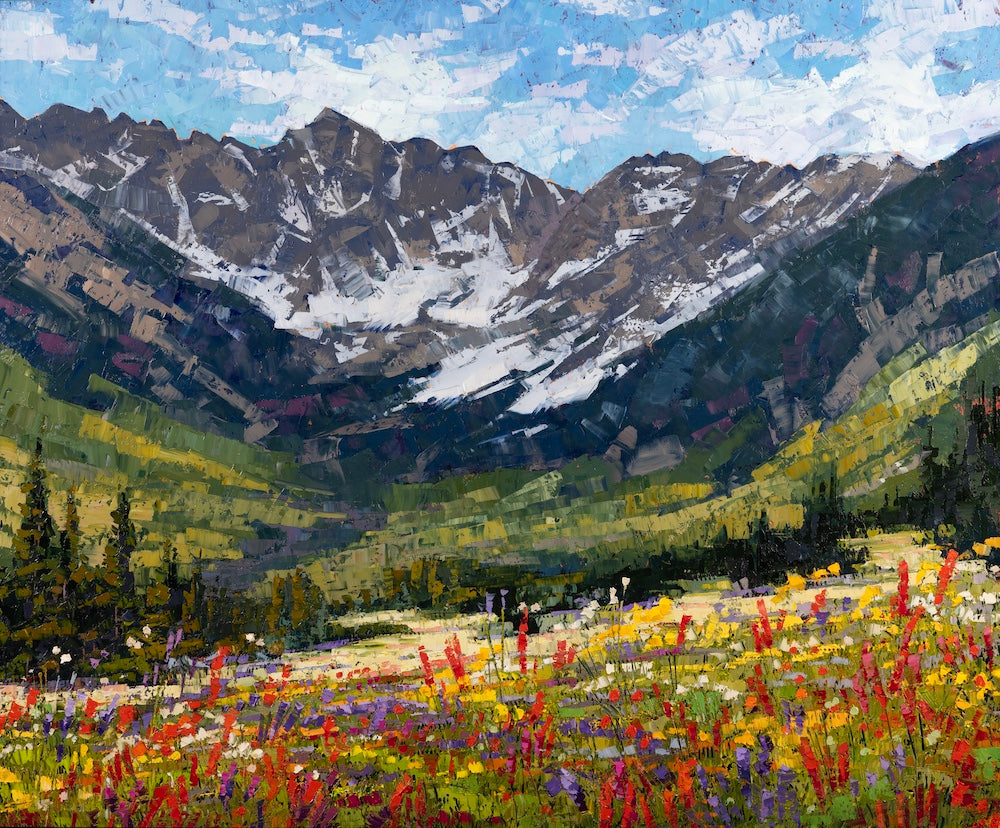 Western abstract ainting of mountains with snow and a field of colorful flowers by Robert Moore