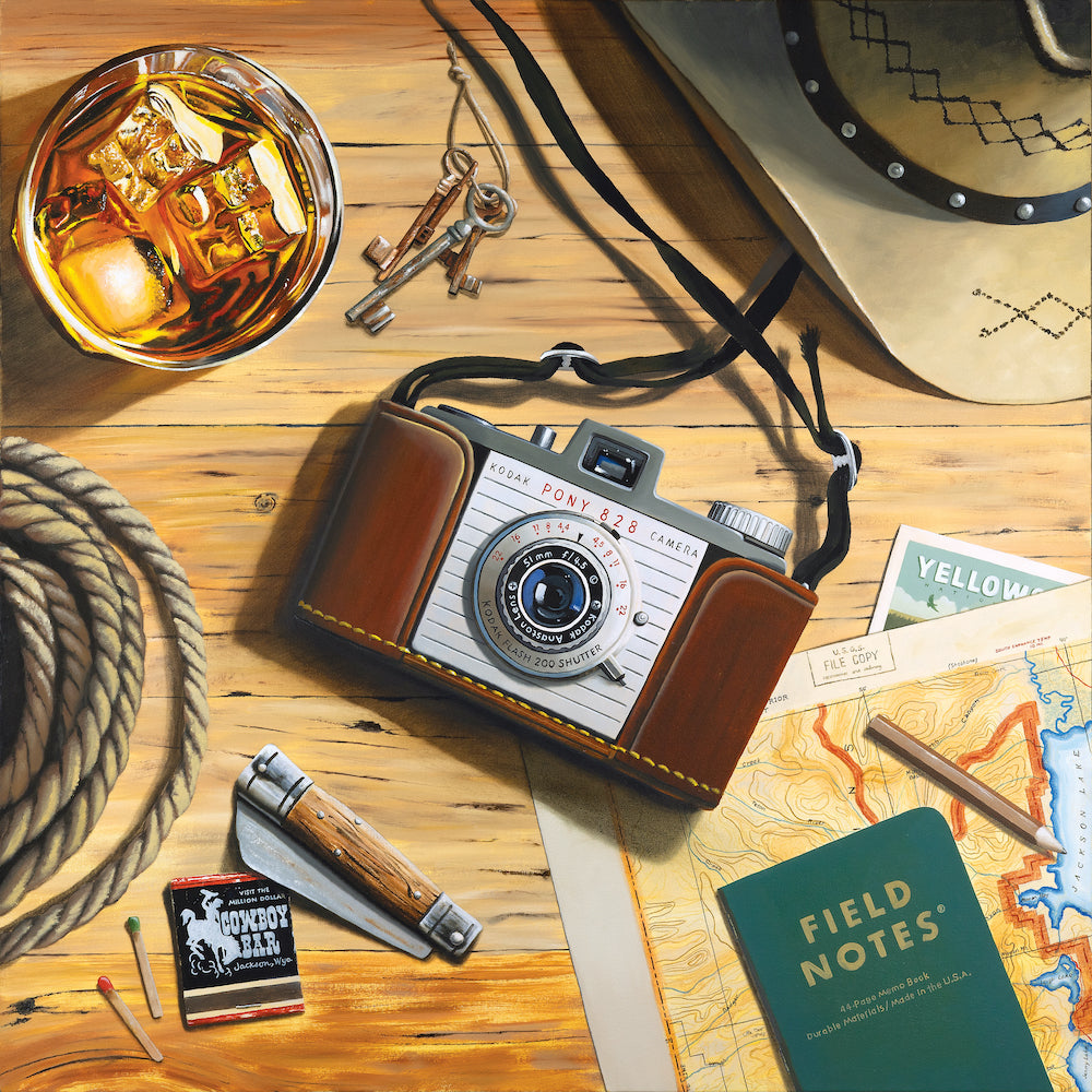Painting of a vintage camera, glass of whiskey, map, and other items on a wooden surface by Scott Yelonek