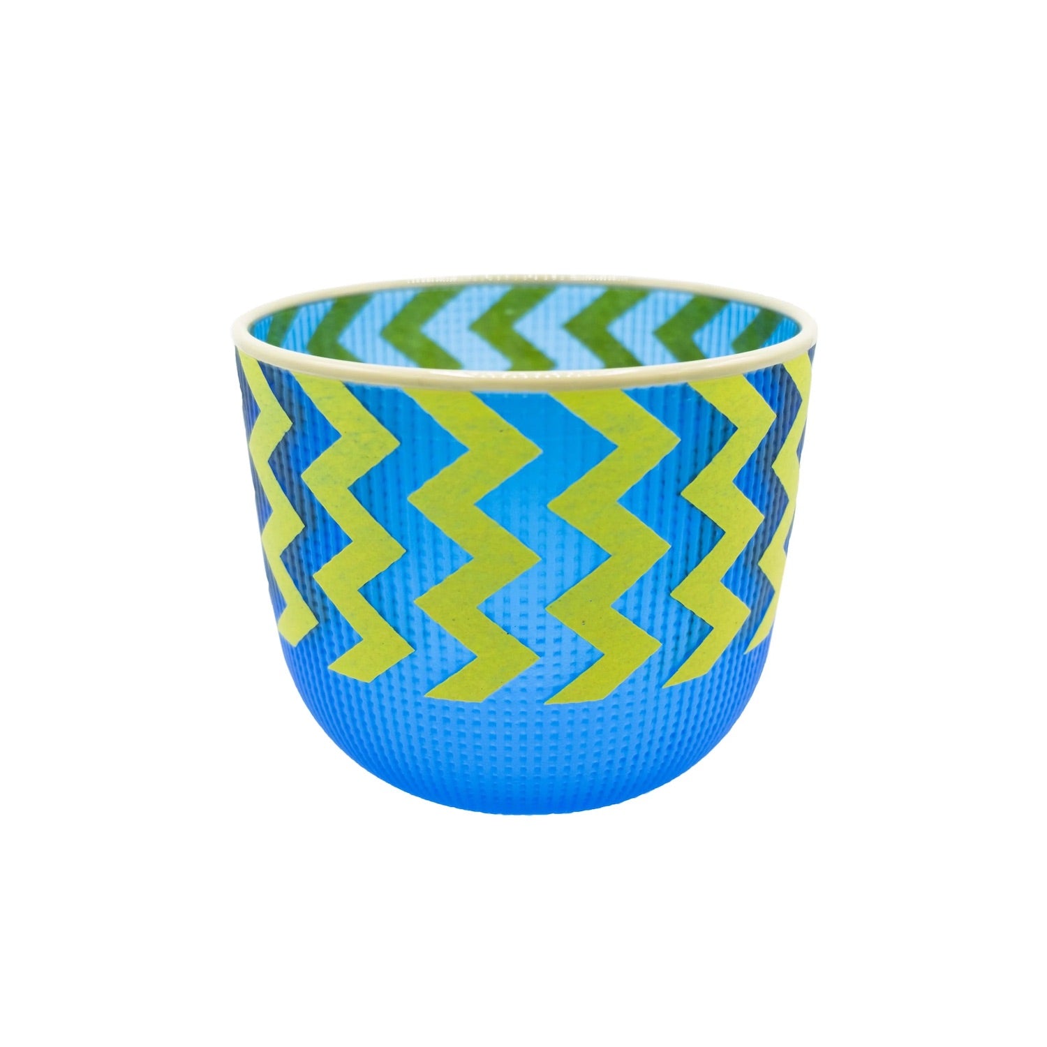Electric blue blown glass basket by Preston Singletary with bold lime-green zigzag patterns inspired by Indigenous weaving designs.